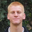 Portrait of Colin with a backdrop of foliage